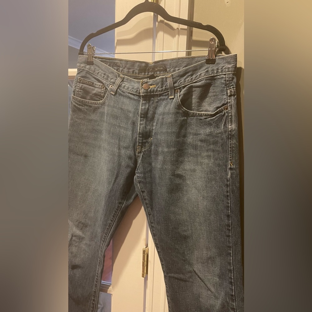 Men’s Calvin Klein boot cut jeans. 100% cotton. 34”